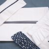 Funda almohada línea blanca habitación